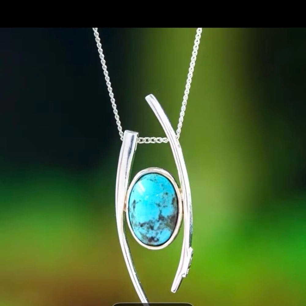 Elegant Silver and Turquoise Pendant Necklace